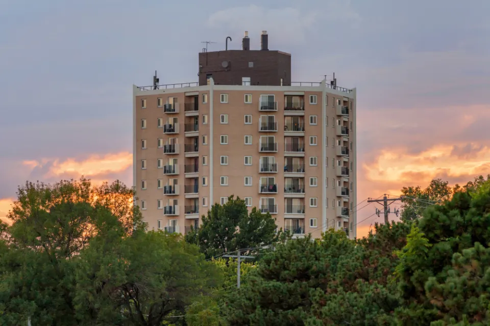 View of high-rise apartment building in St. Paul, Minnesota at sunset